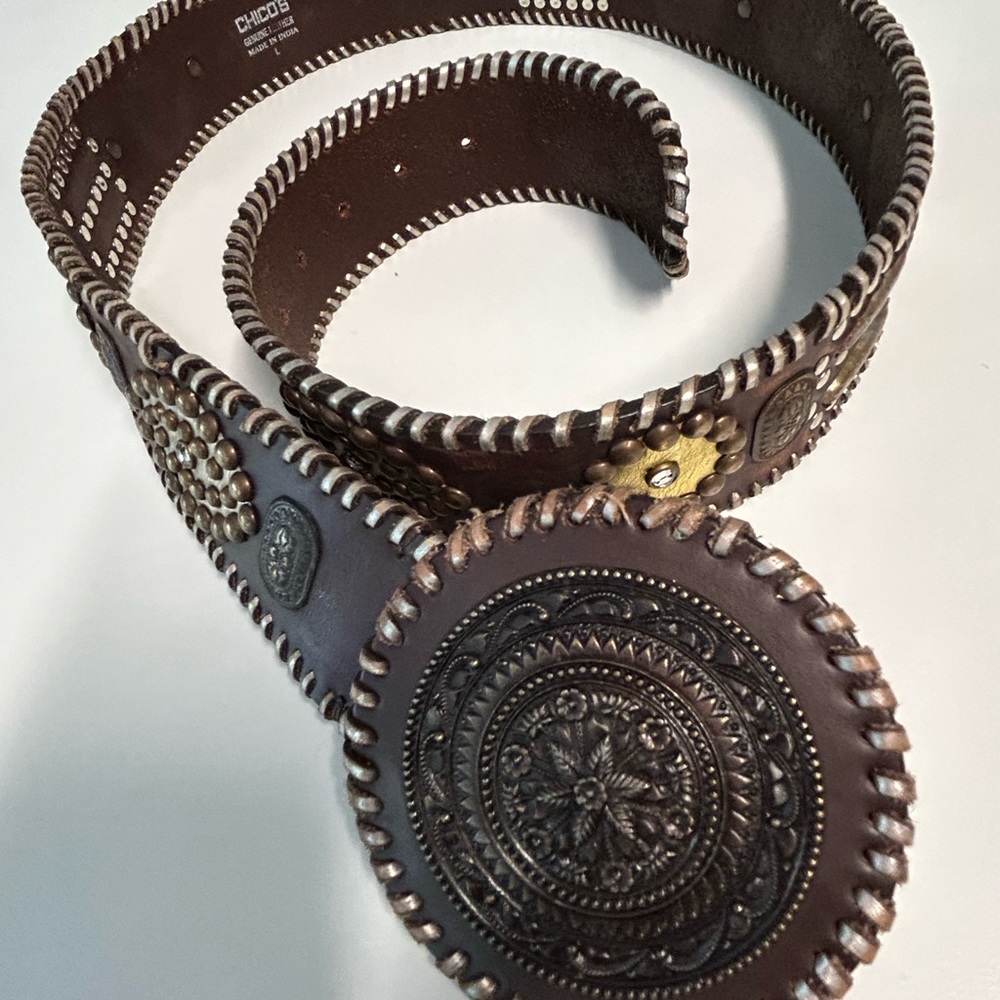 Made in India, brown leather belt with metal, jewel embellishments.